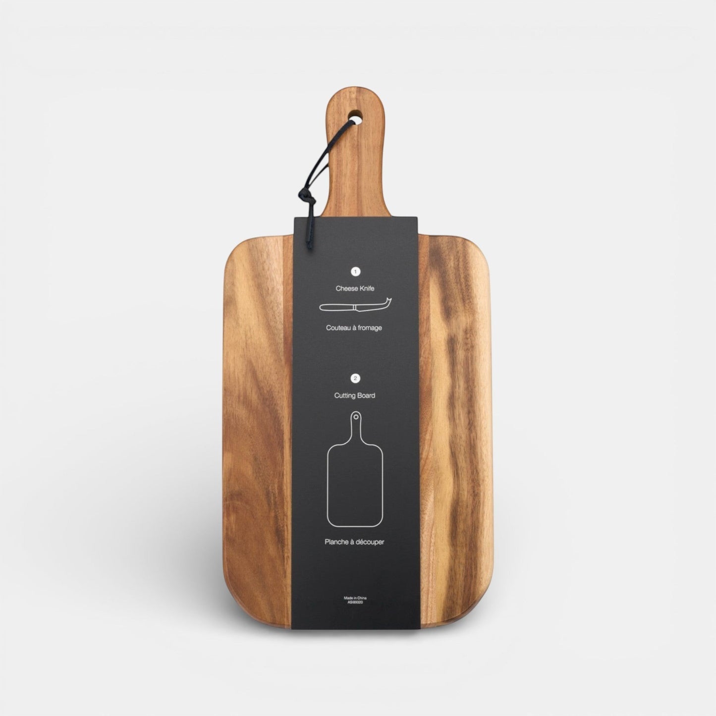Impression M acacia wood cheese board with handle and hanging strap, featuring a black product label.