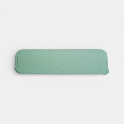 Impression M Hera biodegradable wheat straw utensil set in a light green speckled travel case