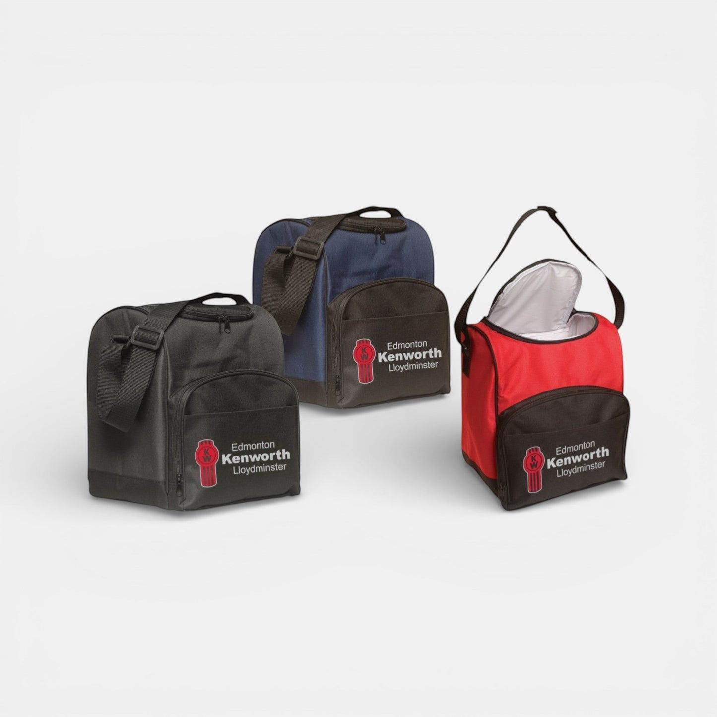 Impression M insulated lunch bags in black, navy, and red with Edmonton Kenworth Lloydminster branding and shoulder straps