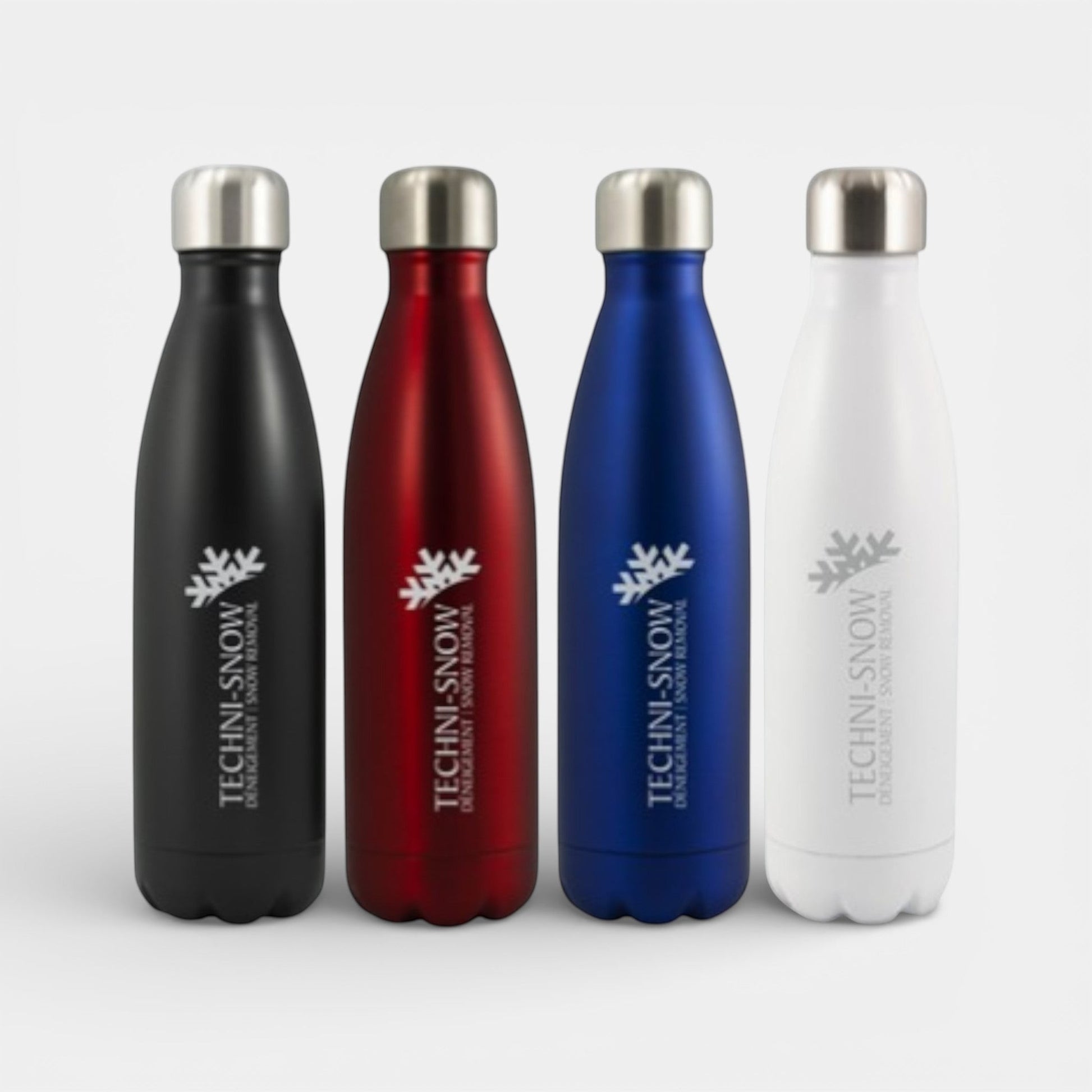 Impression M Inverness 1943 stainless steel insulated water bottles in black, red, blue, and white with logo print.
