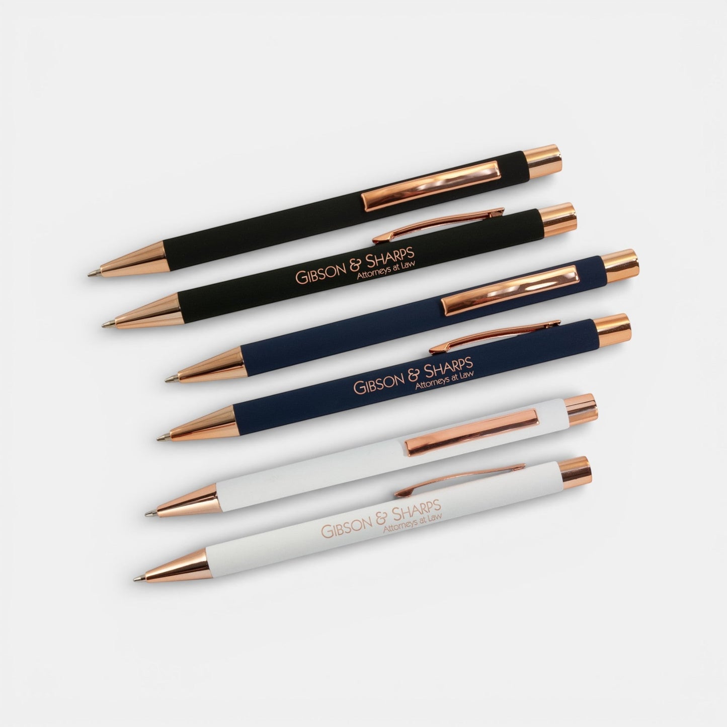 Impression M Lyvia 2063 ballpoint pens in black, navy, and white with rose gold accents and custom laser engraving.