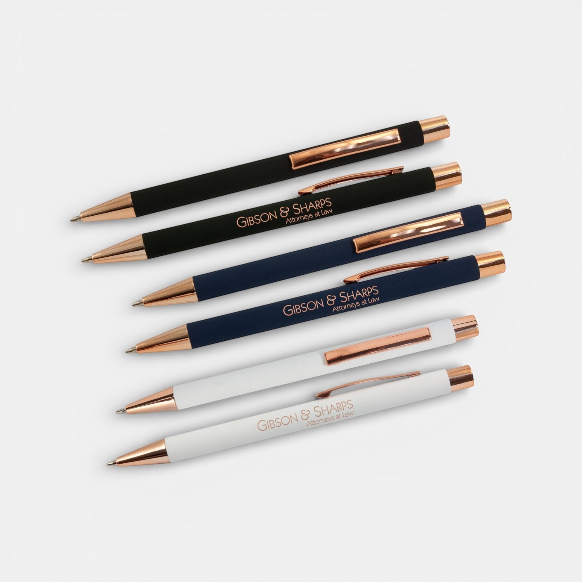 Impression M Lyvia 2063 ballpoint pens in black, navy, and white with rose gold accents and custom laser engraving.