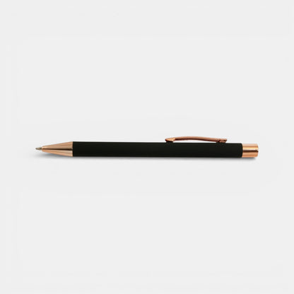 Impression M Lyvia 2063 ballpoint pen in matte black aluminum with elegant rose gold accents and clip.