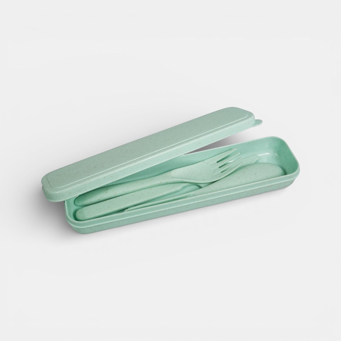 Impression M biodegradable wheat straw utensil set in light green with a matching travel case.